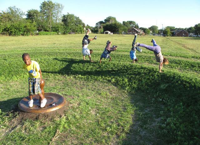 ^Graem Whyte and Faina Lerman, Memory Field (2010). Groundcover, earth, drainage system, cistern, 3′ high x 100′ in diameter. Image courtesy of the artists.